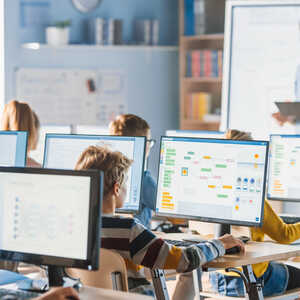 children on computers in school