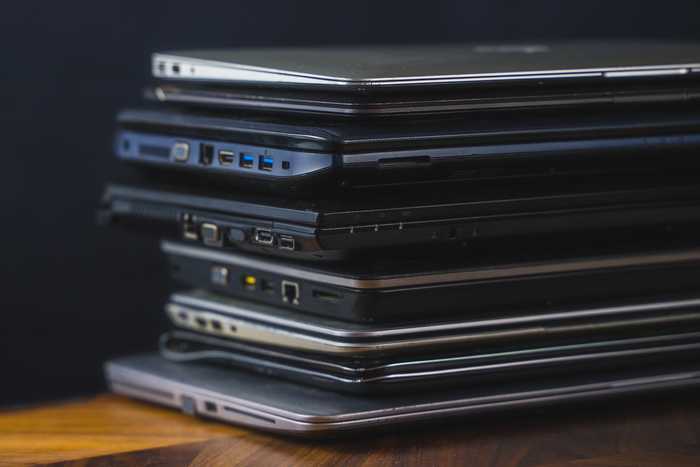 A pile of old laptops