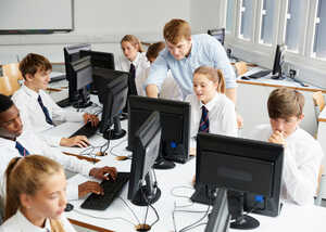 students using computers in school