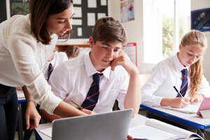 students using laptop in school students using laptop in school