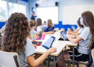 kids using laptops in a science lesson kids using laptops in a science lesson